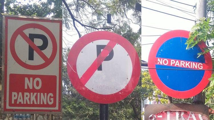 99 percent NO PARKING signboards